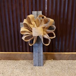 wooden cross with burlap bow